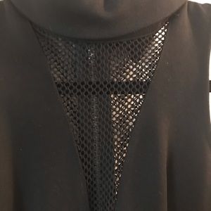 Short black dress with mesh insets